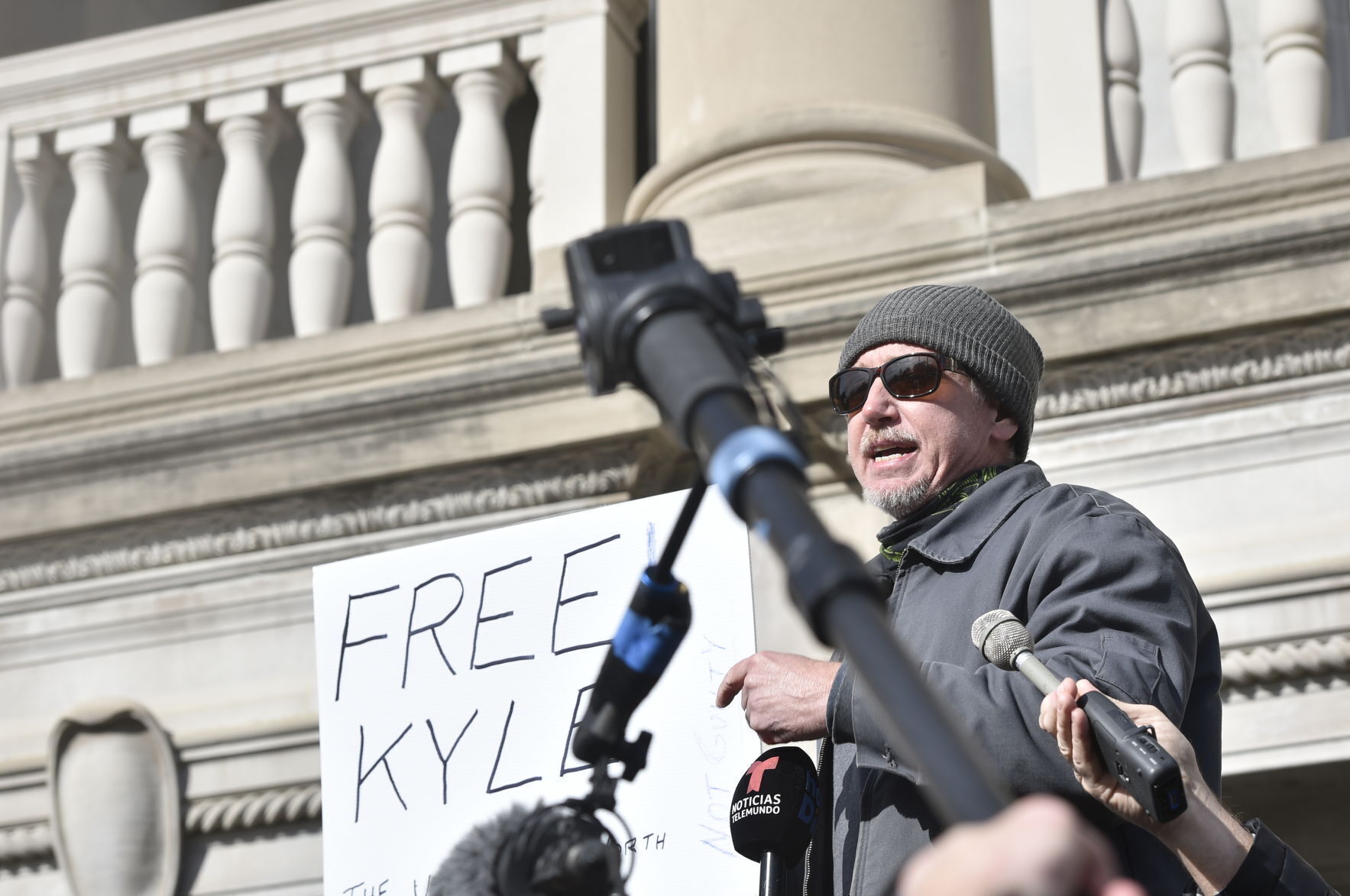 Man who shared multiple different names with press speaks to cameras in support of Rittenhouse not guilty verdicts